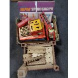 A box containing vintage games and models, sketch-a-graph, boxed Computacar etc,