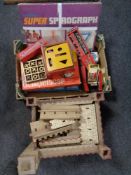 A box containing vintage games and models, sketch-a-graph, boxed Computacar etc,
