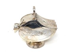 A silver plated sugar scuttle with scoop