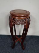 A Chinese hardwood plant stand