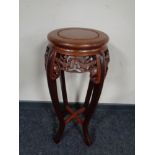 A Chinese hardwood plant stand
