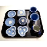 A tray containing approximately ten pieces of Wedgwood blue and white Jasperware including dishes,