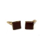 A pair of gold plated on silver cuff links