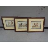 A set of three framed boxing prints