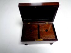 A Regency rosewood sarcophagus form tea caddy