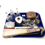 A tray containing hand fans, plated cutlery, glass bells, trinket box etc.