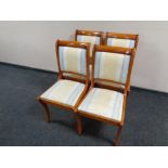 A set of four Bradley dining chairs upholstered in classical fabric