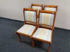 A set of four Bradley dining chairs upholstered in classical fabric