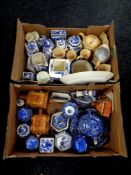 Two boxes containing assorted ceramics to include Sylvac caddies, Ringtons caddies and teapots,