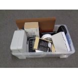 A box of miscellany to include Omron blood pressure monitor, cash box, alarm clocks etc.