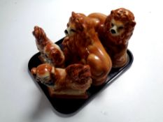 A tray of a pair of antique Staffordshire pottery spaniels,