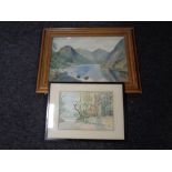 An early 20th century watercolour, river through a mountainous landscape, in a gilt frame,