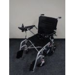 A Mobility plus electric light weight wheel chair (less than six months old)