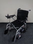 A Mobility plus electric light weight wheel chair (less than six months old)