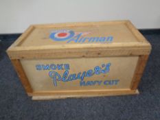 A pine and cardboard Players Navy Cut crate together with a further Schweppes pine crate.