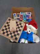 Two boxes of chess board and pieces, assorted soft toys, Disney toys and beakers etc.