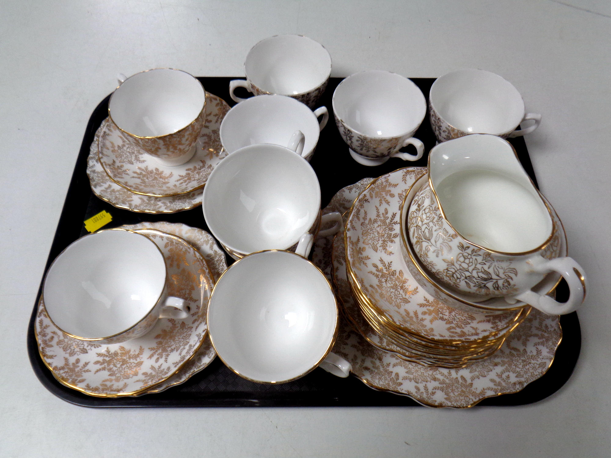 A tray containing thirty pieces of Royal Vale bone tea china.