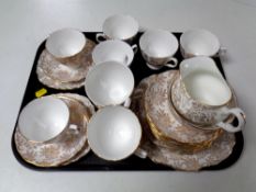 A tray containing thirty pieces of Royal Vale bone tea china.