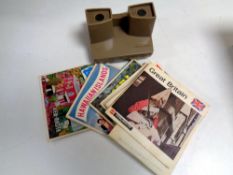 A Viewmaster together with seven reels to include Great Britain, Switzerland, mounted police etc.