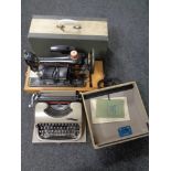 A vintage cased typewriter together with a 20th century cased Singer electric sewing machine.