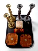 A tray of mid 20th century Bakelite cruet set, antique brass candlesticks, cigarette box,