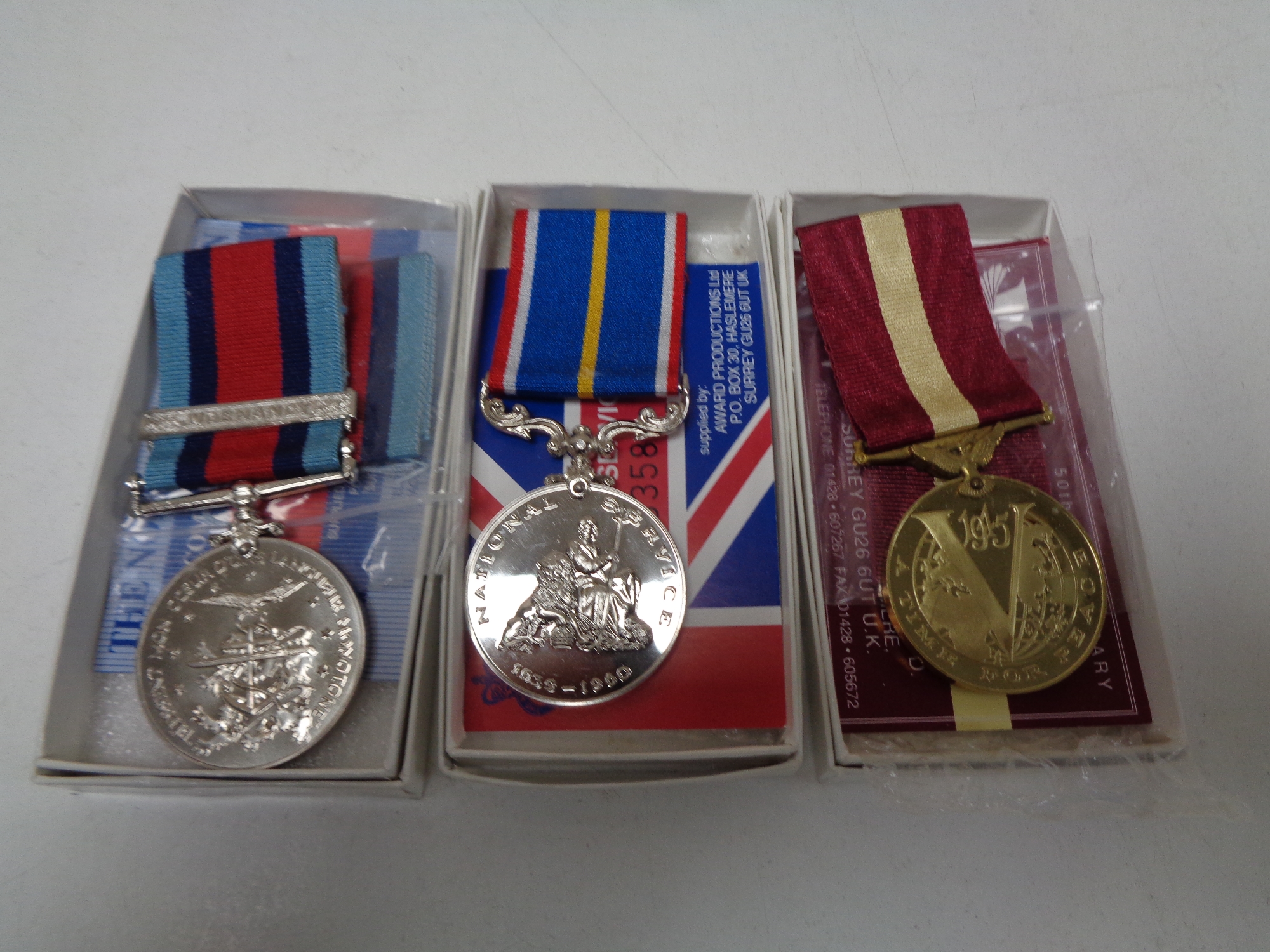 Three replica commemorative medals to include Normandy Campaign medal,