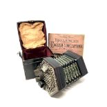 A Lachenal & Co 48 button concertina, pierced metal ends, six fold bellows, serial number 4388,
