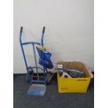 A sack barrow together with heavy duty ratchet straps and a box of a quantity of electrical cabling.