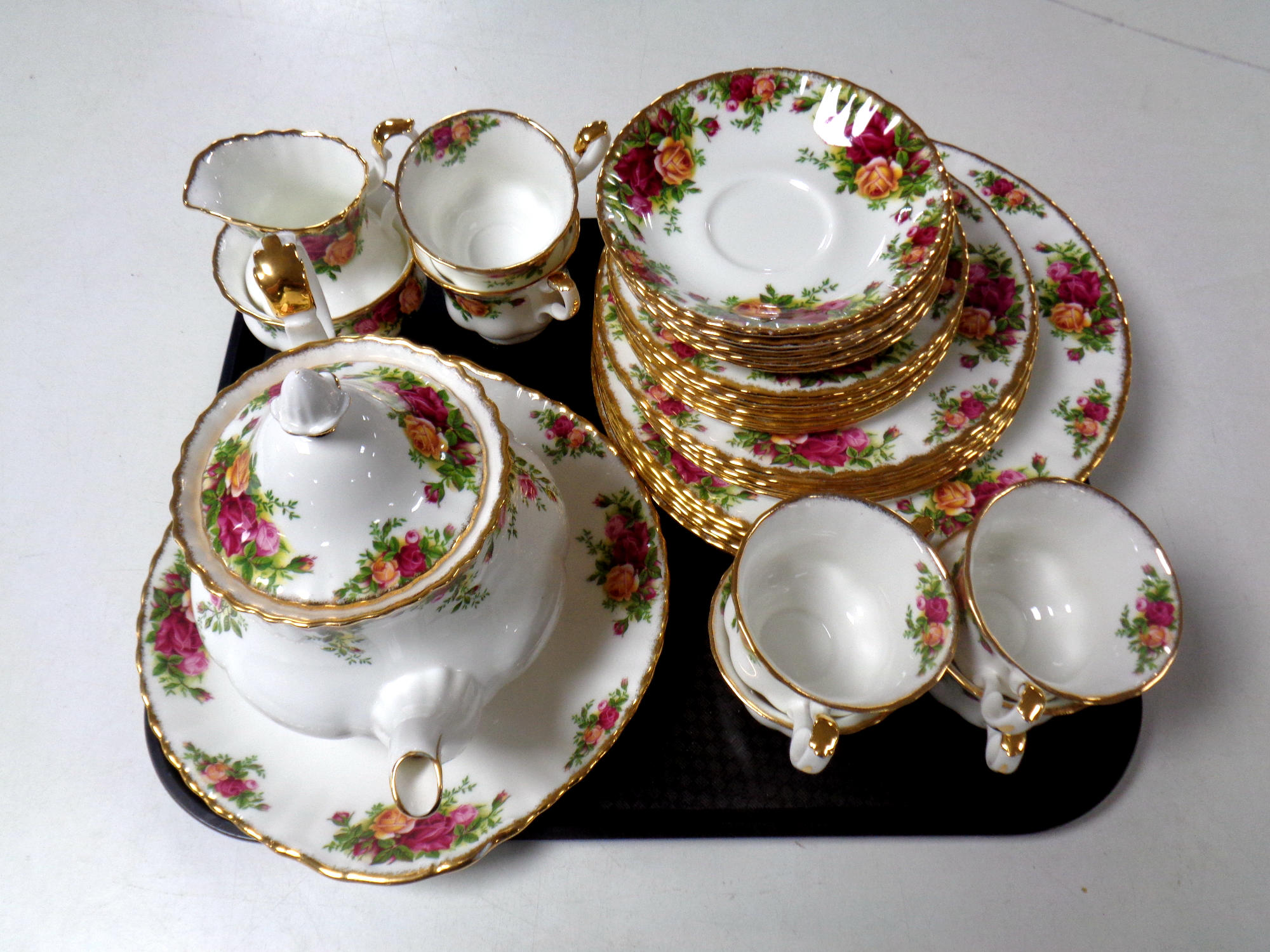Thirty-four pieces of Royal Albert Old Country Roses tea and dinner china.