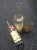 Two whisky bottles comprising Bells and Mackinlays (empty),