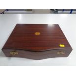 An Edwardian inlaid mahogany canteen containing stainless steel cutlery.
