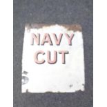 A part enamelled sign bearing Navy Cut advertisement.