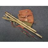 A small quantity of fly fishing rods to include a split cane example together with a fishing bag