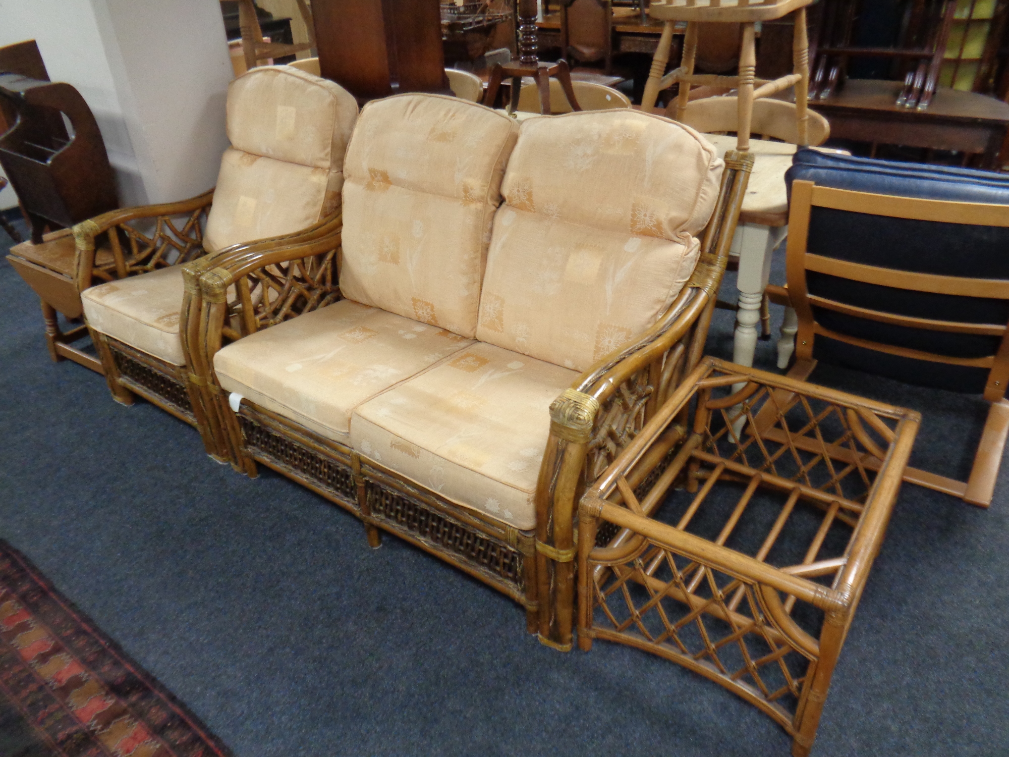 A bamboo and wicker two piece conservatory suite with matching coffee table (no glass)