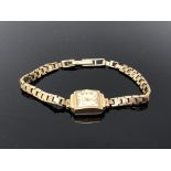 A lady's 9ct gold Helvetia wristwatch on 9ct gold strap. CONDITION REPORT: 11.