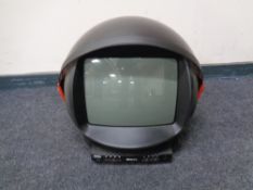 A 1980's Philips Discoverer space helmet TV together with a further Philips table lamp