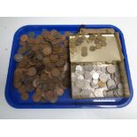A vintage tin and cloth bag containing a large quantity of decimal and pre-decimal coins to include