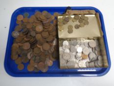 A vintage tin and cloth bag containing a large quantity of decimal and pre-decimal coins to include