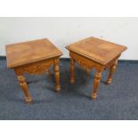 A pair of American style occasional tables