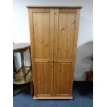 A pine double door wardrobe