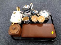 A tray of twelve cased silver plated tea spoons with sugar tongs, wooden tea caddy, ceramic tea pot,