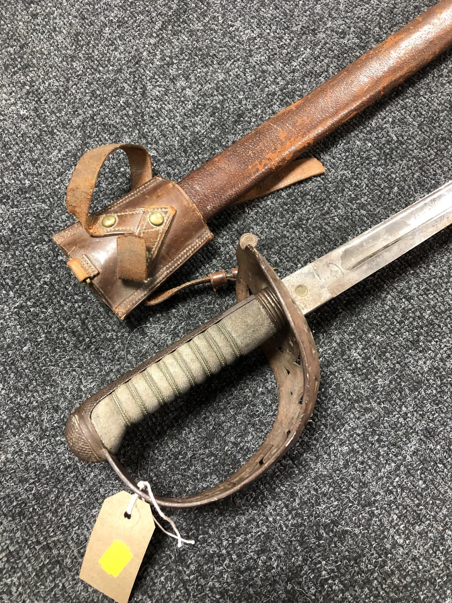 A British 1896 pattern heavy cavalry sword by Sandilands & Son of London, in leather scabbard. - Image 2 of 11