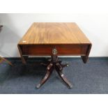 A nineteenth century mahogany flap sided occasional table fitted a drawer