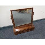 A 19th century inlaid mahogany dressing table mirror fitted two drawers.