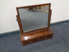 A 19th century inlaid mahogany dressing table mirror fitted two drawers.