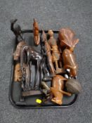 A tray of a quantity of wood carvings to include tribal figures,