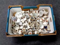 A box containing a large quantity of crested china
