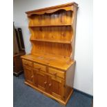 A pine triple door welsh dresser