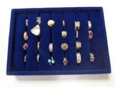 A ring tray containing a quantity of assorted silver and dress rings