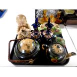A tray containing miscellany to include German bisque figure of a baby eating chocolate,